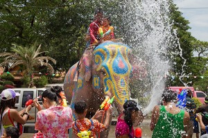 People splash others with water to hope for the next good harvest