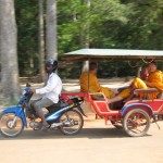 Hire a tuk tuk driver to travel to Angkor Wat