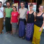 Tourists follow the Myanmar traditional fashion